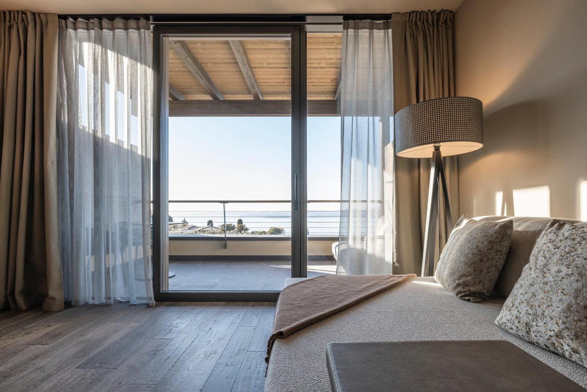 Hotel Cape Of Senses Torri Del Benaco Habitación foto